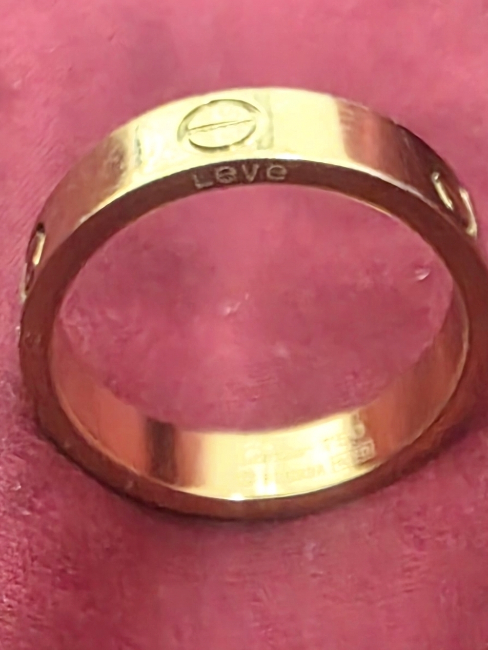 RingI gorgeous. Unisex. Like new. Gol Plate. Love Engraved Gold Ring  Jewelry.